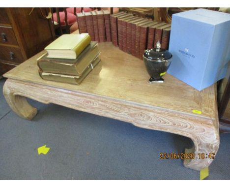 A contemporary limed wood large coffee table 18 1/2" x 59 1/2" x 58 1/2", along with two smaller matching lamp tables 22" x 2