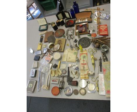 A lot of miscellaneous items of interest to include bobbins, lighters, pipes, coins, miniature books, metalware, playing card