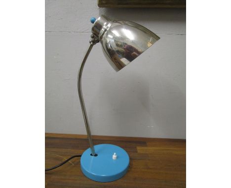 A mid century industrial chrome and painted neck adjustable lamp 