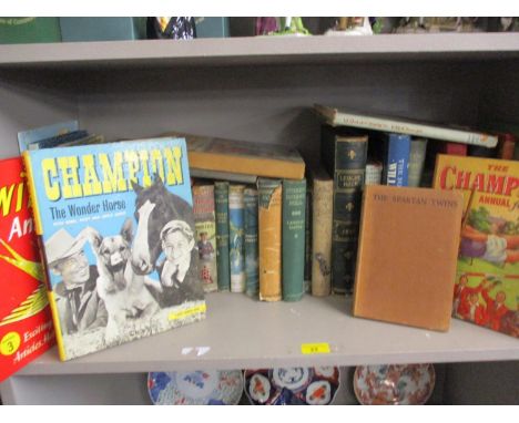 A quantity of mainly mid 20th century books to include Champion the Wonder Horse and other annuals and a 1961 First Edition T