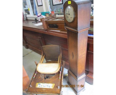 A 1930s/40s metamorphic high chair with a table, and an oak cased grandmother clock 