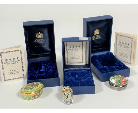 A collection of three Halcyon Days enamel pill boxes, an oval box of basket of fruit, (hx 2cm x l x 5.5cm x d 3cm) an enamel 