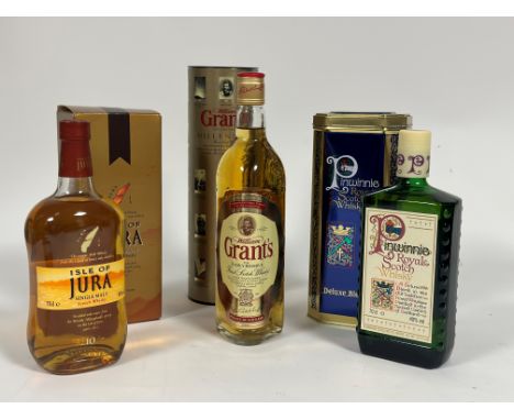 A bottle of Isle of Jura ten year old single malt whisky,  a bottle of Grant's Family Reserve Millennium Scotch whisky and a 