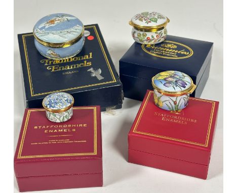 A collection of enamel pill style boxes including a Traditional Enamels Snowman box, ( h 3cm x d 6cm) a Crummeles Rosehip box