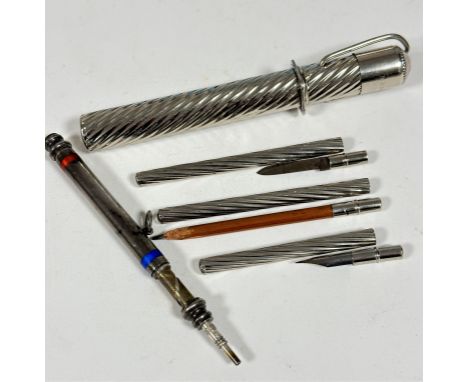 A white metal blue and red enamel banded double ended propelling pencil, (l x 7.5cm closed) and a chrome plated travelling wr