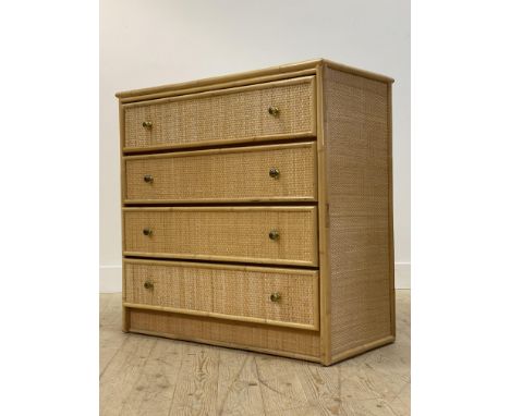 A vintage Boho style rattan chest, with inset plate glass top over four drawers, H93cm,  W94cm, D46cm