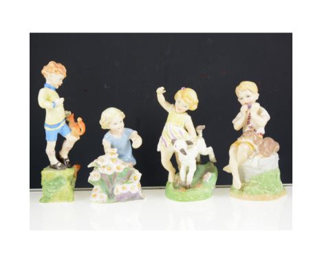 A collection of Royal Worcester Months of the Year figurines, comprising January, February, March, April, May, June, July, Oc