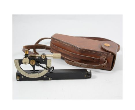 A portable hand held inclinometer, E R Watts &amp; Son, London, No. 22735, 20cm, in a leather holster.