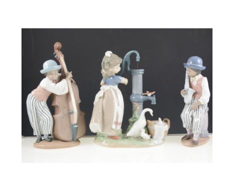 Lladro group, A Big Sister, No. 5735, width 22cm, a Lladro group Girl at a pump, three Lladro band figures, a Nao figure, (6)