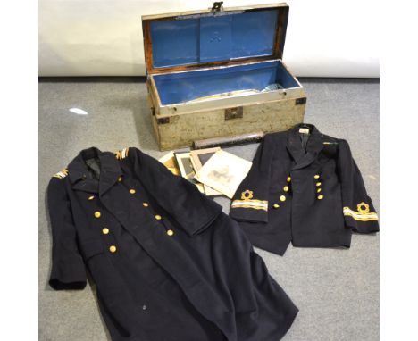 Naval uniform in a tin trunk and a canvas bound trunk