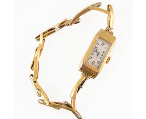 A lady's vintage wrist watch, rectangular arabic dial in a 9 carat yellow gold case hallmarked Edinburgh 1934 on a 9 carat ex
