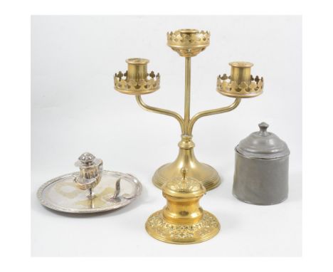 A brass three light Ecclesiastical candelabrum, 26cm, circular brass inkwell, embossed design with hinged cover and glass wel