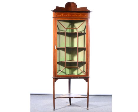 Edwardian inlaid mahogany freestanding corner cupboard, astragal glazed panelled door enclosing shelves, shelf under, height 