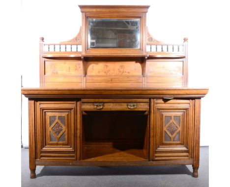 A Victorian oak and pollard oak sideboard, mirror-panel back over a shaped shelf, the base section with a single frieze drawe