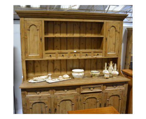 Reclaimed pine kitchen dresser, two shelf delft rack, with spice drawers and cupboards, the base with four drawers over four 