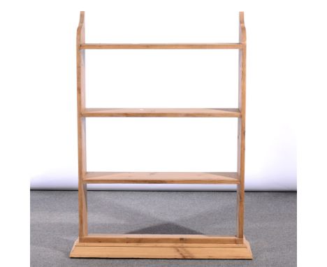 Pine wall shelf unit, three heights under a cornice piece, width 80cm.