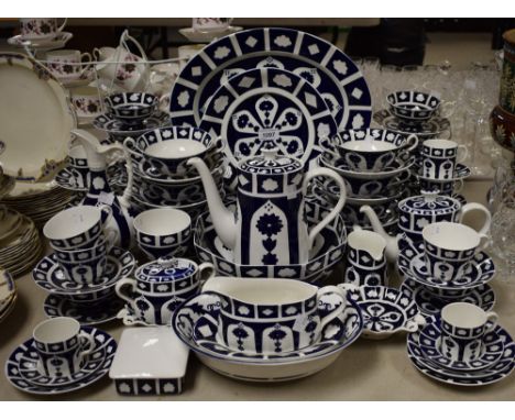 A large quantity of Royal Crown Derby blue and white unfinished Imari dinner, coffee and teaware, comprising coffee pot, coff