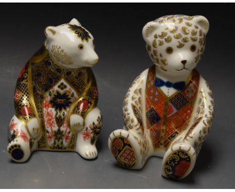 A Royal Crown Derby Honey Bear paperweight, 1128 pattern, printed mark (second);  another, Blue Bow Tie Bear (second)