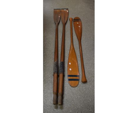 A pair of vintage wooden Oars;  another pair (4)