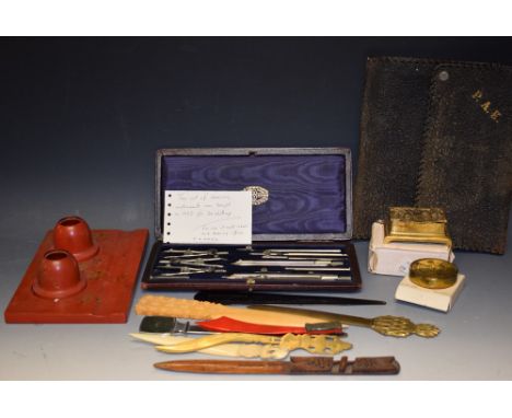 Letter opener and others, vintage office desk top items, including technical drawing set, Bakelite pen and inkwell tray; etc.