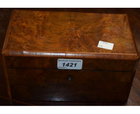 A Victorian walnut tea caddy, two compartments