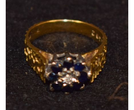 A diamond and sapphire cluster ring, 18ct gold shank, size J, 4.1g gross