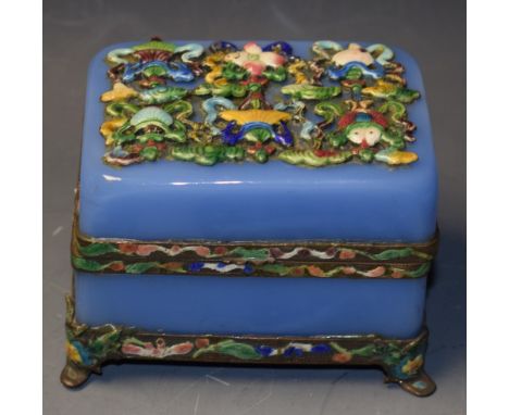 A Chinese cloisonné enamel and blue opaque glass rounded rectangular casket, hinged cover applied with flowers, foliage and s