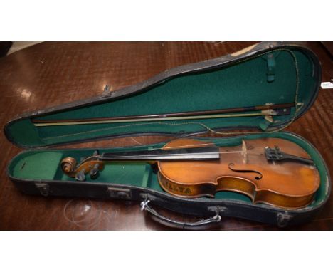 A German Stradivarius copy violin,two piece back,  33.5cm long. labelled Made in Western Germany, cased with bow