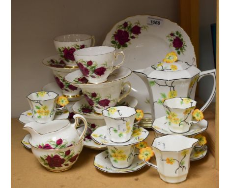 A Melba six piece coffee set with yellow flower handles comprising coffee pot, cream jug, cups and saucers; a Colclough six p