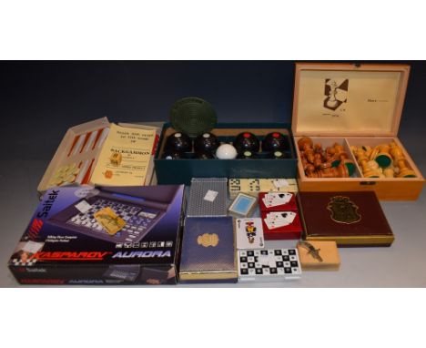 A set of Brookes & Adams Ltd carpet bowls, boxed with instructions en suite; an Orig. Maus novelty miniature cap pistol as a 