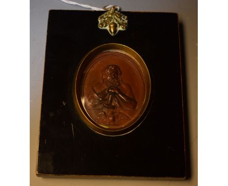 A 19th century patinated oval Royal Polytechnic Institution medallion/plaque, cast with Jove holding a hammer, the apron with