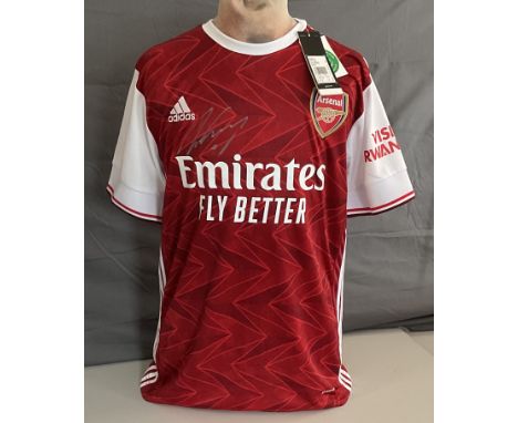 Aaron Ramsey signed Arsenal football shirt. Ramsey is a Welsh professional footballer who plays as a midfielder for Ligue 1 c