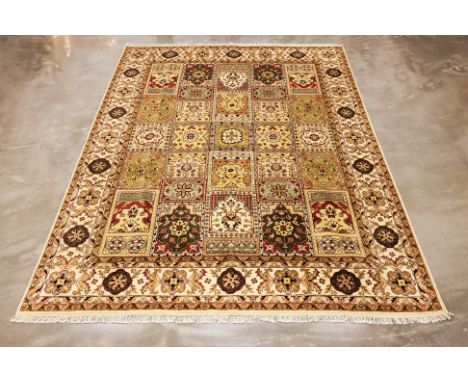 A KASHMIRI PANELLED WOOL CARPET (303 x 240cm)
Hand knotted wool, of panelled 'carpet in carpet' design
Condition: For a condi