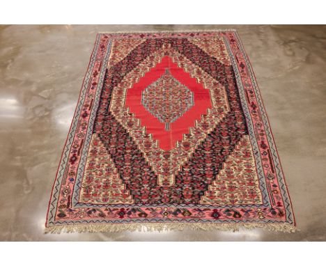 A SENNEH KILIM CARPET (285 x 200cm) Hand knotted wool, Condition: For a condition report or further images please email hello