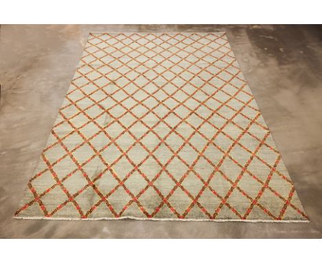 A LARGE CONTEMPORARY WOOL CARPET (365 x 267cm)
Hand knotted wool, trellis design
Condition: For a condition report or further