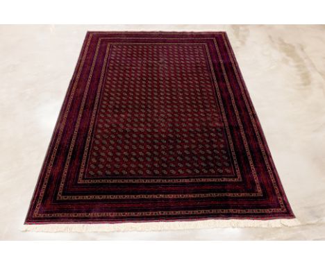 A KWHAJA ROSHNAI BOKHARA WOOL CARPET (297 x 205cm)
Hand knotted wool, detailed all over design
Condition: For a condition rep
