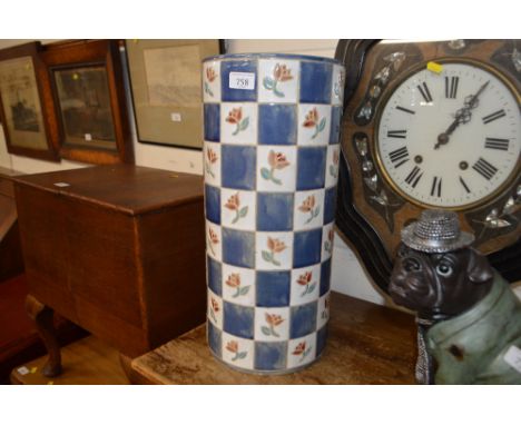 A floral decorated pottery stick stand 
