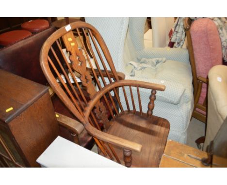 An elm seated stick back Windsor chair 