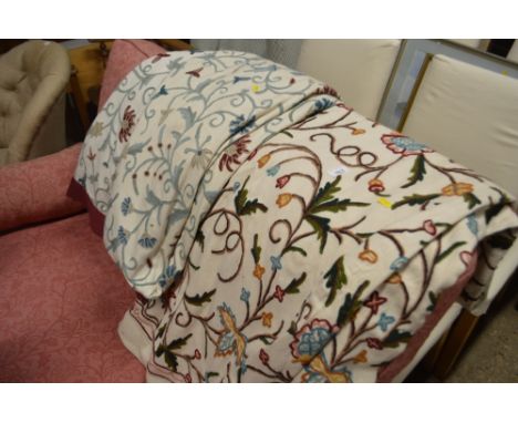 A floral embroidered textile; and a pair of curtains 
