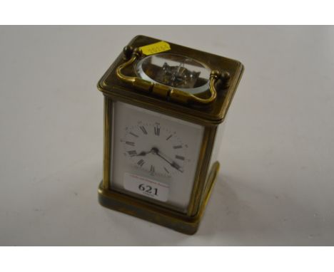 A brass cased striking carriage clock