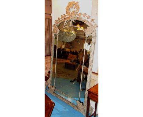 WALL MIRROR, Continental style, of large proportions having an arched top with bird and leaf decoration, 230cm H x 141cm.