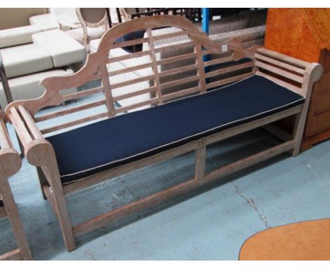 GARDEN BENCH, Lutyens style, with a slatted back, sides and seat having a loose navy blue cushion, bears the name 'Hard Woods