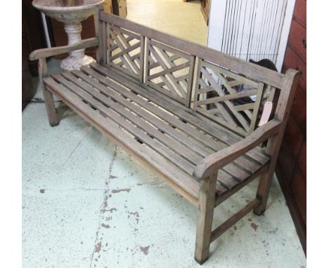GARDEN BENCH, weathered teak with country house style lattice back, 180cm W. 