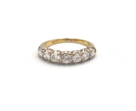 An 18ct yellow gold seven stone diamond ring - approx total diamond weight 1.4ct - diamonds are bright and lively - head size