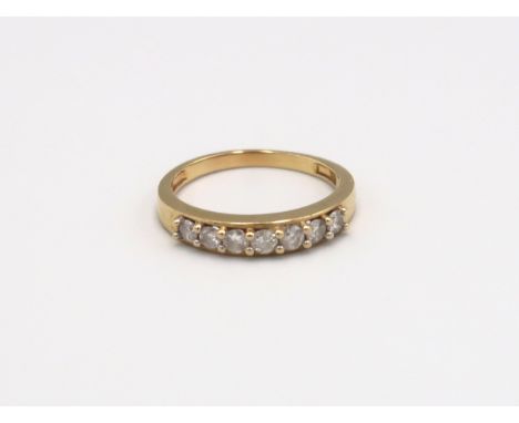 An 18ct yellow gold and diamond half eternity ring, size P, approx 3.41 grams 