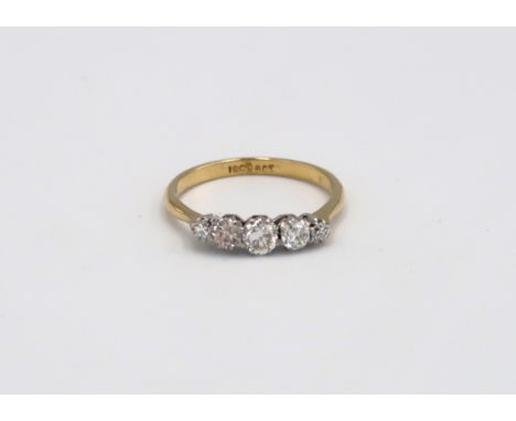 An 18CT Yellow Gold five stone Diamond ring, Head size approx. 16MM X 4MM. Size P-Q, Diamonds are Well Matched Bright and Liv