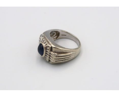 A 9ct white gold ring with oval star sapphire to shoulder, approx 9.77 grams, size N 