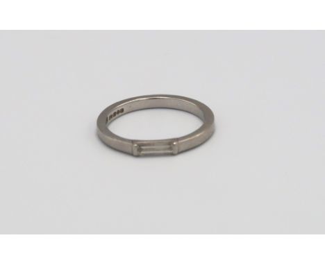 A platinum baguette diamond eternity ring, size K/L, approx 3.25 grams 