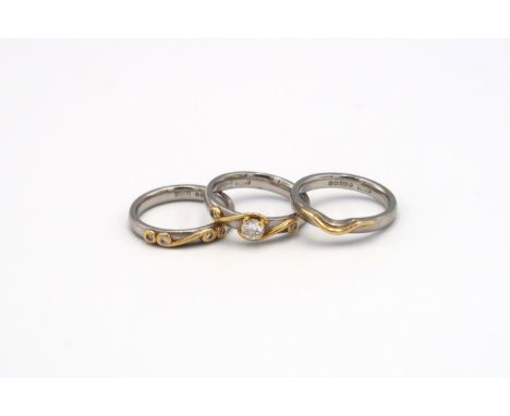 A set of three platinum and gold rings to include one set with a brilliant cut diamond, estimated 0.25ct, G/H, SI1/2 with two