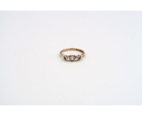 A 9ct three stone ring size L - weight approx 1.61 grams 